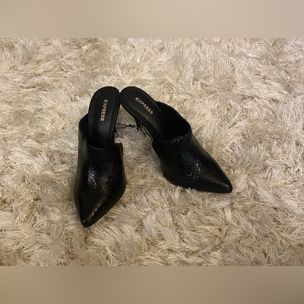 Brand new Express black heeled mules.